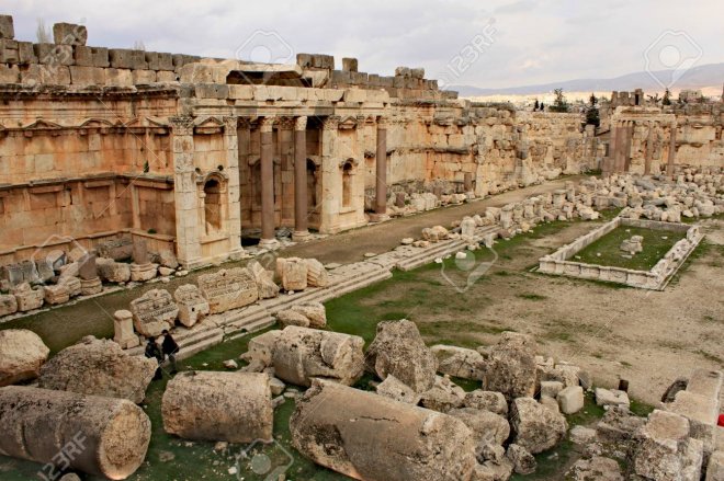 https://assets.roar.media/assets/JwKgmflT2m2yvw9n_90087222-baalbek-ruins-of-the-great-court-of-the-ancient-phoenician-city-with-range-of-mountains-at-the-backg.jpg
