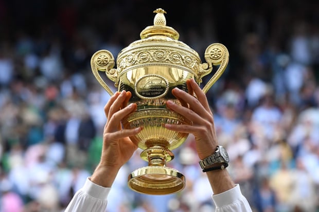 https://assets.roar.media/assets/eCi368KZ8feBp9dW_Novak-Djokovic-raises-the-winner’s-trophy-Photograph-Ben-Stansall-AFP-Getty-Image.jpg