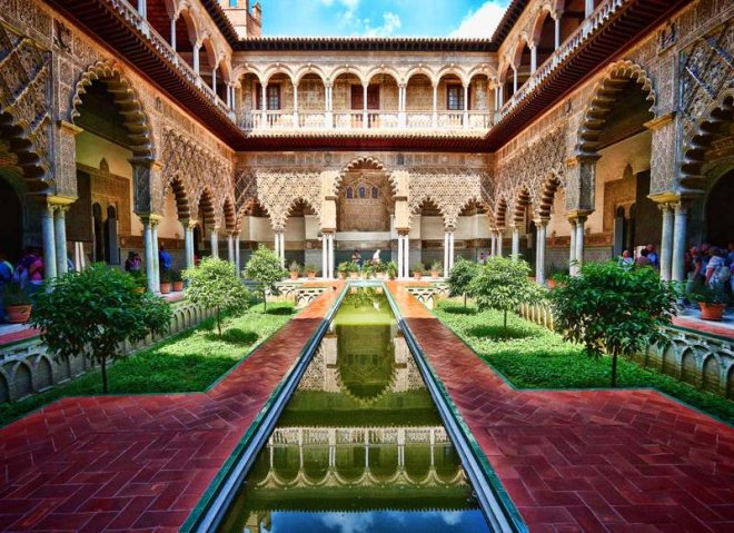 https://assets.roar.media/assets/oTl2J3PSkoaozRtf_Seville-Royal-Alcazar-Muslim-Travels-Spain-Tours.jpg